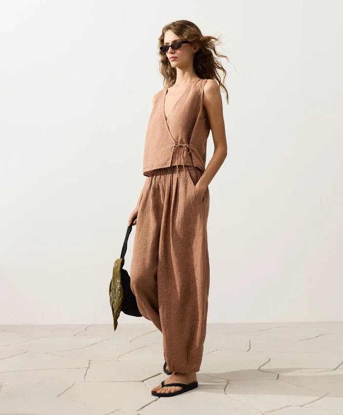 Pantaloni a palloncino a righe in 100% lino Pantaloni a palloncino a righe in 100% lino