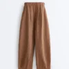 Pantaloni a palloncino a righe in 100% lino Pantaloni a palloncino a righe in 100% lino