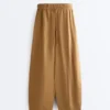Pantaloni a palloncino in misto lyocell e 24% lino con cuciture Pantaloni a palloncino in misto lyocell e 24% lino con cuciture