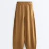 Pantaloni a palloncino in misto lyocell e 24% lino con cuciture Pantaloni a palloncino in misto lyocell e 24% lino con cuciture