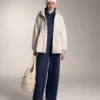 Pantaloni a sacchetto con piega laterale e modal spazzolato Pantaloni a sacchetto con piega laterale e modal spazzolato