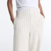 Pantaloni a vita alta a gamba larga con gessato Soft Touch al tatto Pantaloni a vita alta a gamba larga con gessato Soft Touch al tatto