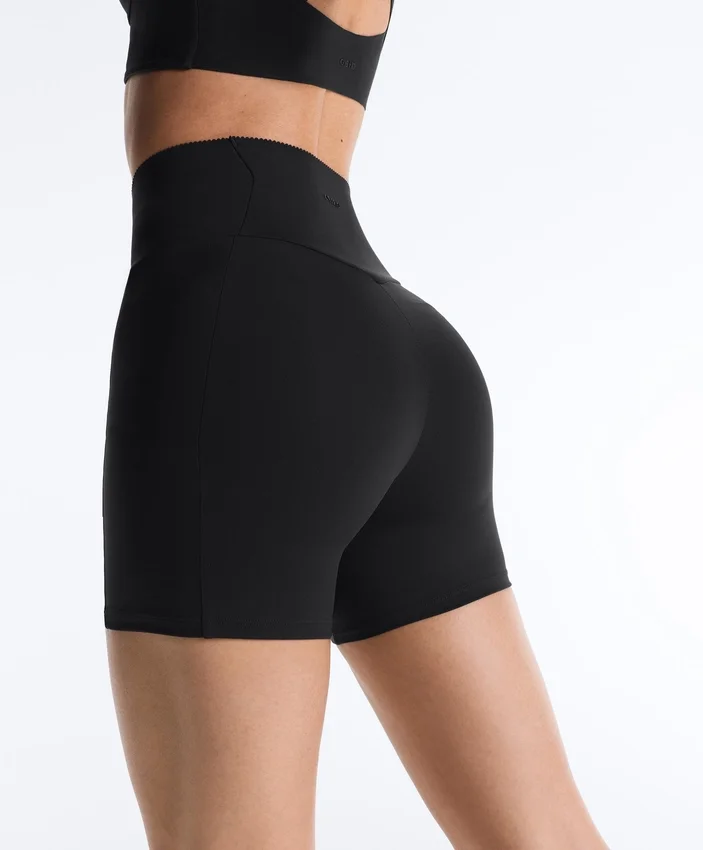 Pantaloni a vita alta con tasca compressiva da 10 cm Pantaloni a vita alta con tasca compressiva da 10 cm