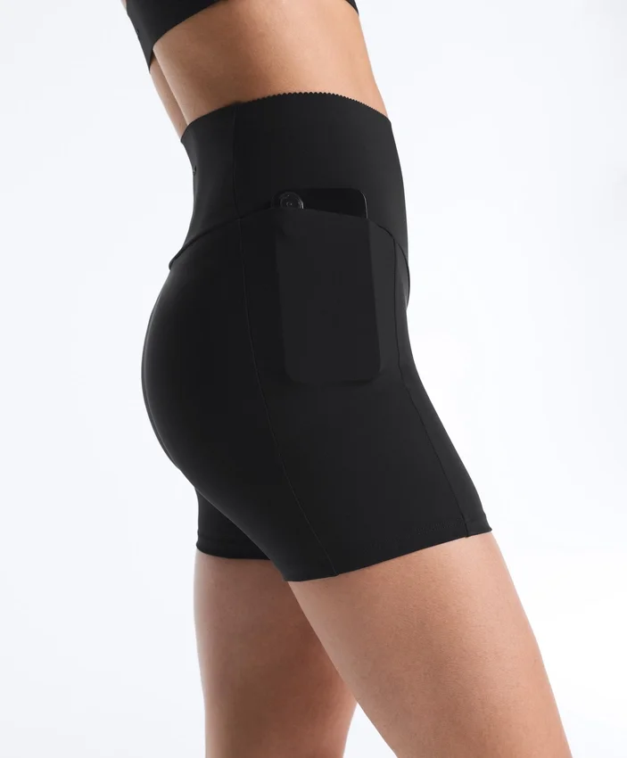 Pantaloni a vita alta con tasca compressiva da 10 cm Pantaloni a vita alta con tasca compressiva da 10 cm