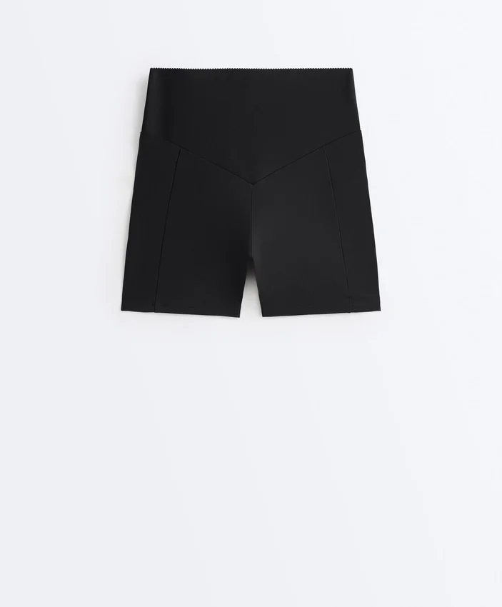 Pantaloni a vita alta con tasca compressiva da 10 cm Pantaloni a vita alta con tasca compressiva da 10 cm