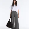 Pantaloni a vita alta e gamba larga in cotone piqué Pantaloni a vita alta e gamba larga in cotone piqué