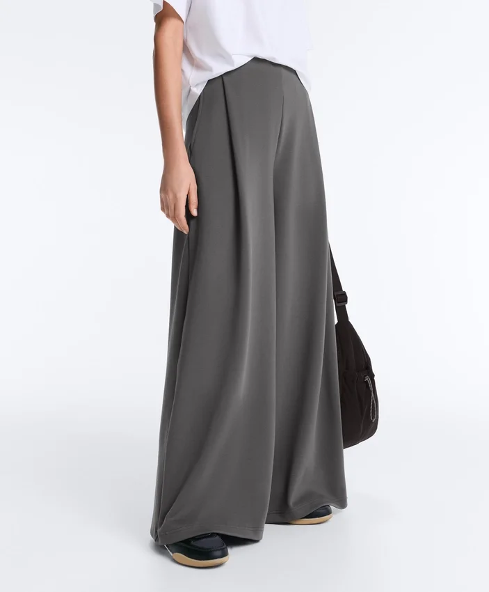 Pantaloni a vita alta e gamba larga in cotone piqué Pantaloni a vita alta e gamba larga in cotone piqué