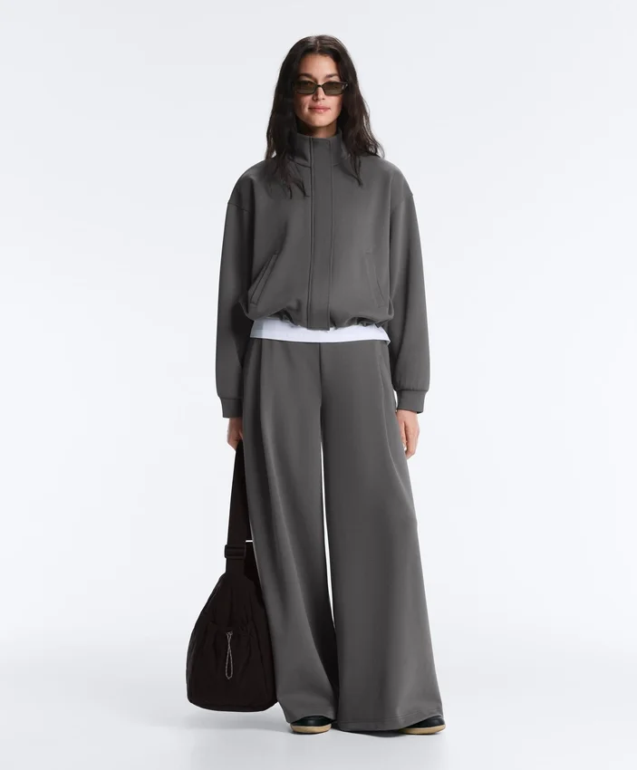 Pantaloni a vita alta e gamba larga in cotone piqué Pantaloni a vita alta e gamba larga in cotone piqué