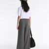 Pantaloni a vita alta e gamba larga in cotone piqué Pantaloni a vita alta e gamba larga in cotone piqué