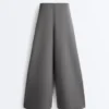 Pantaloni a vita alta e gamba larga in cotone piqué Pantaloni a vita alta e gamba larga in cotone piqué