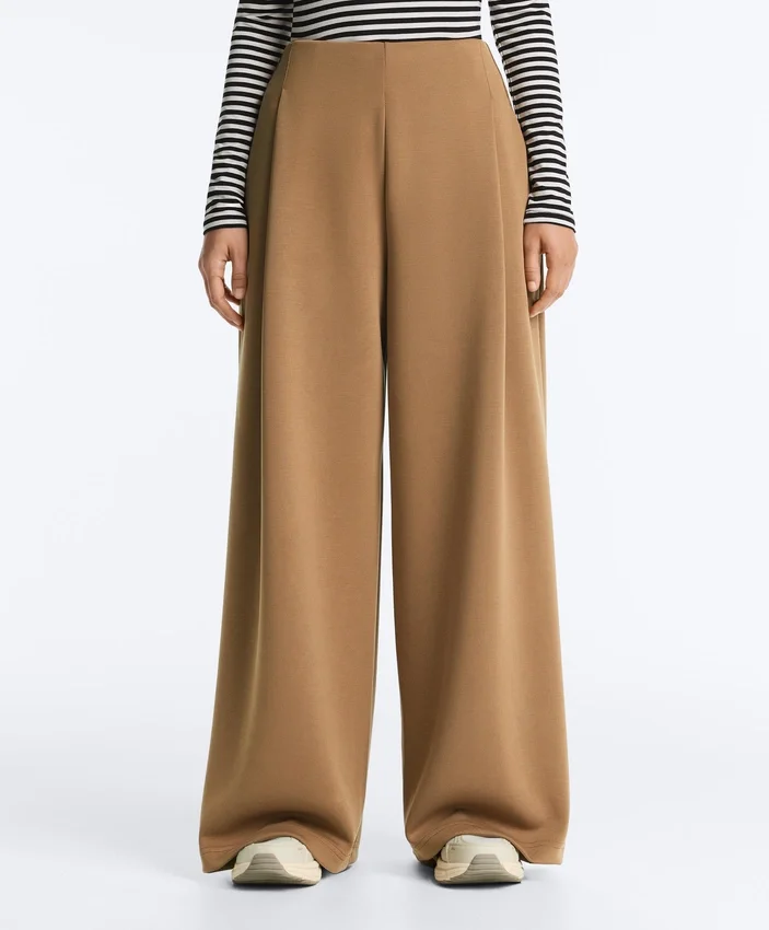 Pantaloni a vita alta in twill a gamba larga con pieghe Pantaloni a vita alta in twill a gamba larga con pieghe