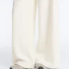 Pantaloni a vita alta in twill a gamba larga con pieghe Pantaloni a vita alta in twill a gamba larga con pieghe