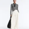 Pantaloni a vita alta in twill a gamba larga con pieghe Pantaloni a vita alta in twill a gamba larga con pieghe