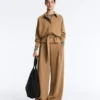 Pantaloni a vita alta in twill a gamba larga con pieghe Pantaloni a vita alta in twill a gamba larga con pieghe