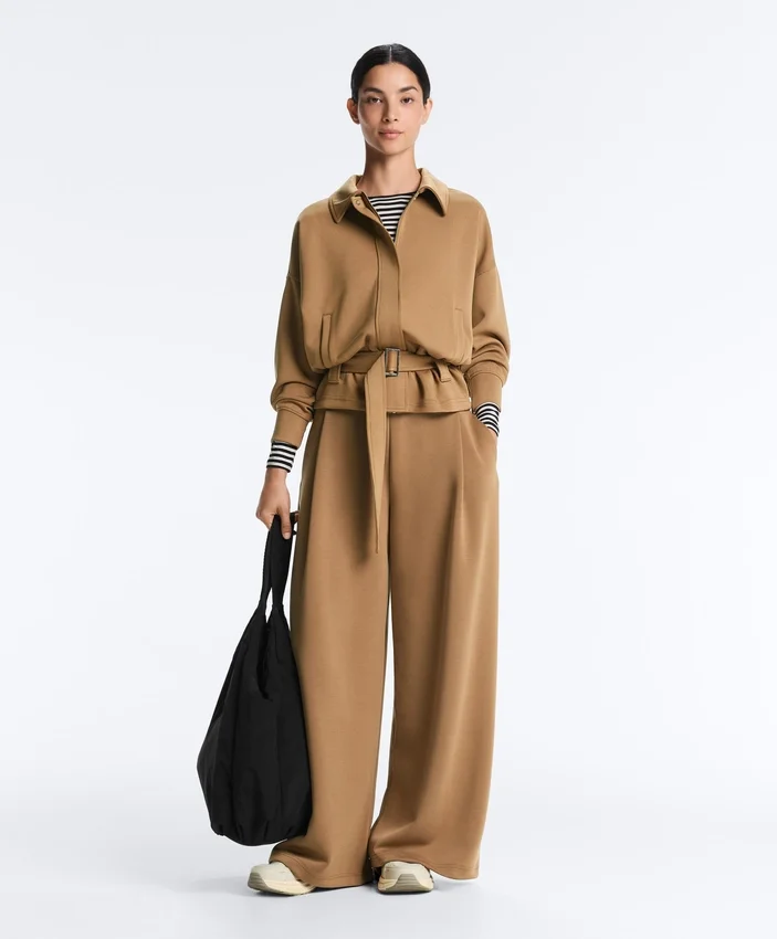 Pantaloni a vita alta in twill a gamba larga con pieghe Pantaloni a vita alta in twill a gamba larga con pieghe