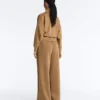 Pantaloni a vita alta in twill a gamba larga con pieghe Pantaloni a vita alta in twill a gamba larga con pieghe