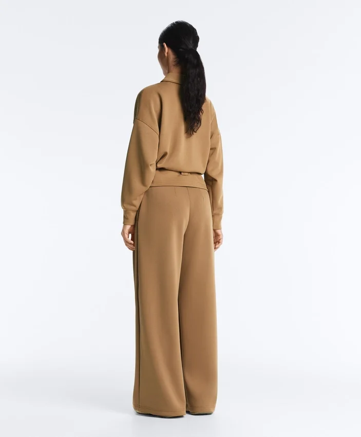 Pantaloni a vita alta in twill a gamba larga con pieghe Pantaloni a vita alta in twill a gamba larga con pieghe