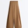 Pantaloni a vita alta in twill a gamba larga con pieghe Pantaloni a vita alta in twill a gamba larga con pieghe