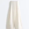 Pantaloni a vita alta in twill a gamba larga con pieghe Pantaloni a vita alta in twill a gamba larga con pieghe