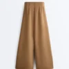 Pantaloni a vita alta in twill a gamba larga con pieghe Pantaloni a vita alta in twill a gamba larga con pieghe
