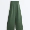 Pantaloni a vita alta in twill a gamba larga con pieghe Pantaloni a vita alta in twill a gamba larga con pieghe
