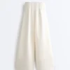 Pantaloni a vita alta in twill a gamba larga con pieghe Pantaloni a vita alta in twill a gamba larga con pieghe