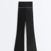 Pantaloni a zampa alta Comfortlux con fiocco Pantaloni a zampa alta Comfortlux con fiocco