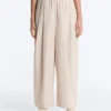 Pantaloni affusolati a pieghe in 100% cotone Pantaloni affusolati a pieghe in 100% cotone