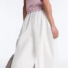 Pantaloni affusolati a pieghe in 100% cotone Pantaloni affusolati a pieghe in 100% cotone