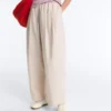 Pantaloni affusolati a pieghe in 100% cotone Pantaloni affusolati a pieghe in 100% cotone