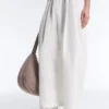 Pantaloni affusolati a pieghe in 100% cotone Pantaloni affusolati a pieghe in 100% cotone