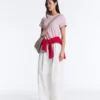 Pantaloni affusolati a pieghe in 100% cotone Pantaloni affusolati a pieghe in 100% cotone
