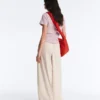 Pantaloni affusolati a pieghe in 100% cotone Pantaloni affusolati a pieghe in 100% cotone
