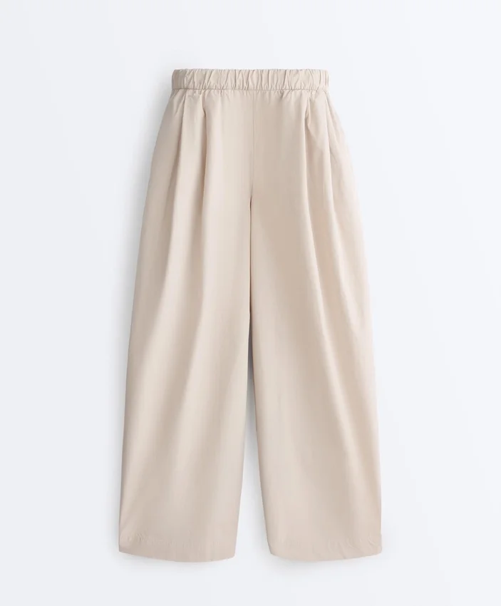 Pantaloni affusolati a pieghe in 100% cotone Pantaloni affusolati a pieghe in 100% cotone
