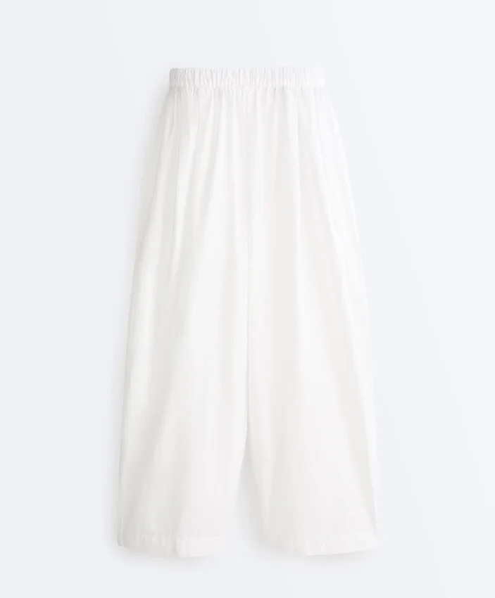 Pantaloni affusolati a pieghe in 100% cotone Pantaloni affusolati a pieghe in 100% cotone