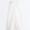 Pantaloni affusolati a pieghe in 100% cotone Pantaloni affusolati a pieghe in 100% cotone