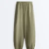 Pantaloni cargo a zampa d’elefante in 100% lino Pantaloni cargo a zampa d’elefante in 100% lino