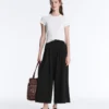 Pantaloni cropped a gamba larga Soft Touch con modal e pieghe Pantaloni cropped a gamba larga Soft Touch con modal e pieghe