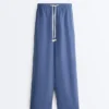 Pantaloni dritti in misto lyocell e 24% lino Pantaloni dritti in misto lyocell e 24% lino
