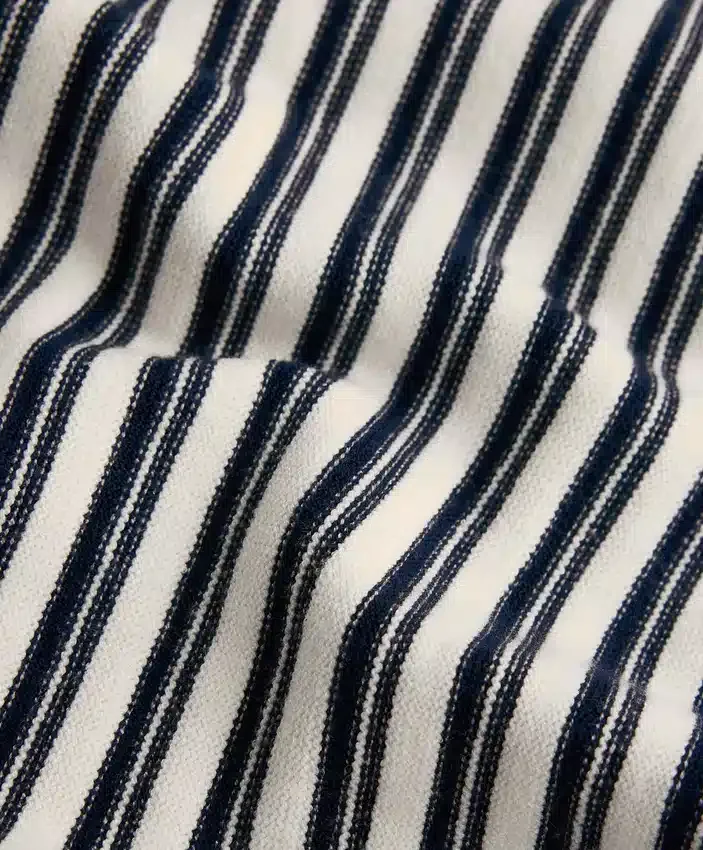 Pantaloni in maglia a gamba larga a righe diagonali Pantaloni in maglia a gamba larga a righe diagonali