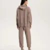 Maglione lungo in maglia con cappuccio Maglione lungo in maglia con cappuccio