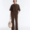 Pantaloni slim a vita bassa in piqué con cotone