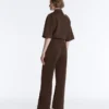 Pantaloni slim a vita bassa in piqué con cotone
