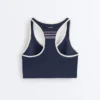 Reggiseno sportivo a sostegno medio compressivo con coppe in gomma