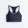 Reggiseno sportivo a sostegno medio compressivo con coppe in gomma