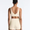 Reggiseno sportivo Comfortlux a sostegno medio con orlo a giorno