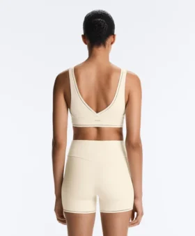 Reggiseno sportivo Comfortlux a sostegno medio con orlo a giorno