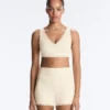 Reggiseno sportivo Comfortlux a sostegno medio con orlo a giorno