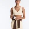 Reggiseno sportivo Comfortlux a sostegno medio con orlo a giorno