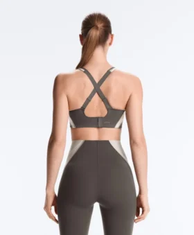 Reggiseno sportivo compressivo riflettente a sostegno rigido